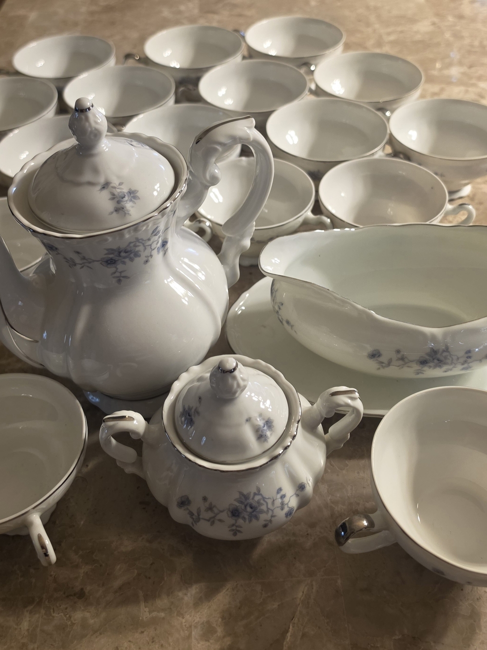 Elegant White Porcelain Tea Set with Blue Floral Accents 20 Pieces